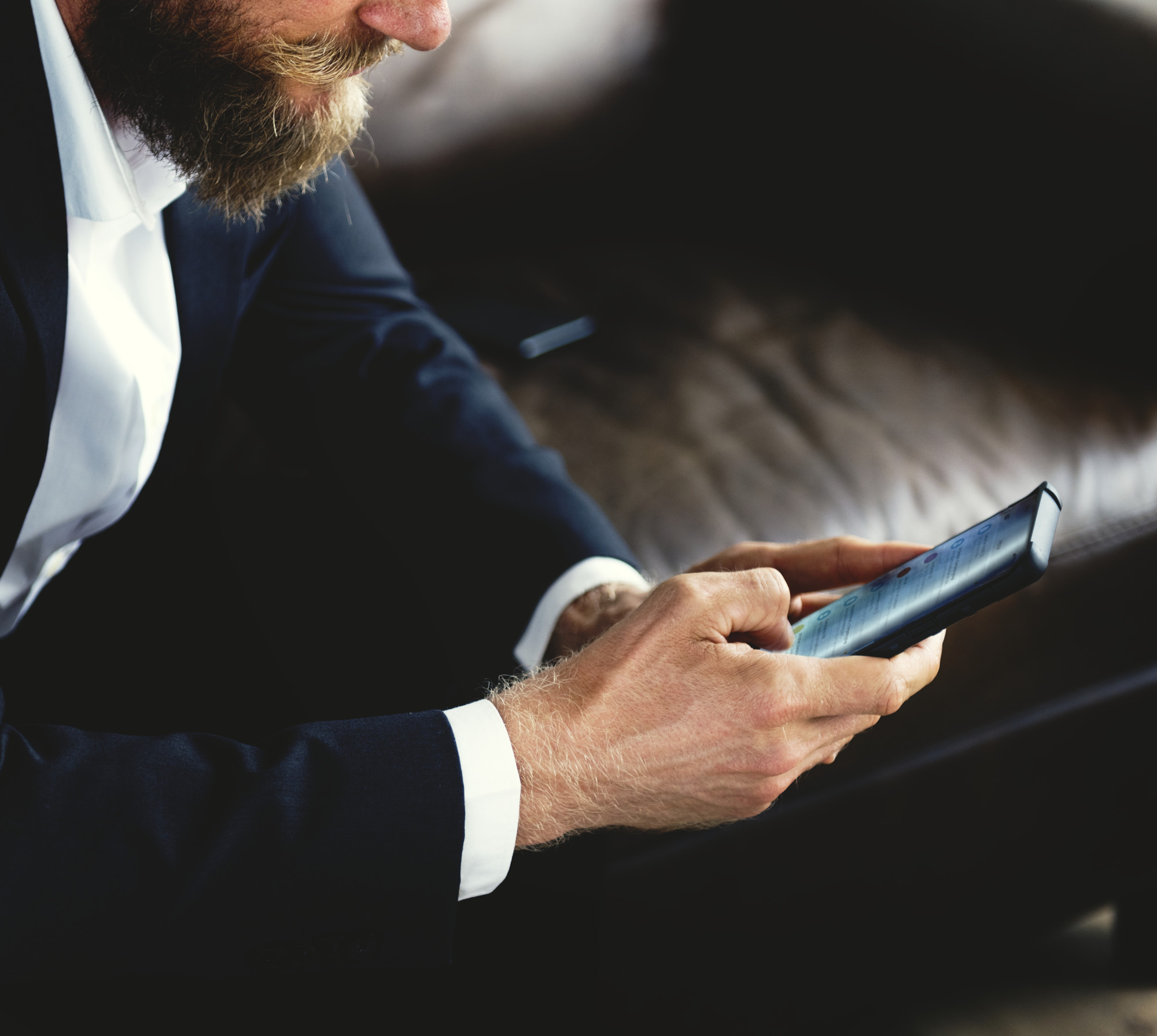 Investor checking portfolio on smartphone